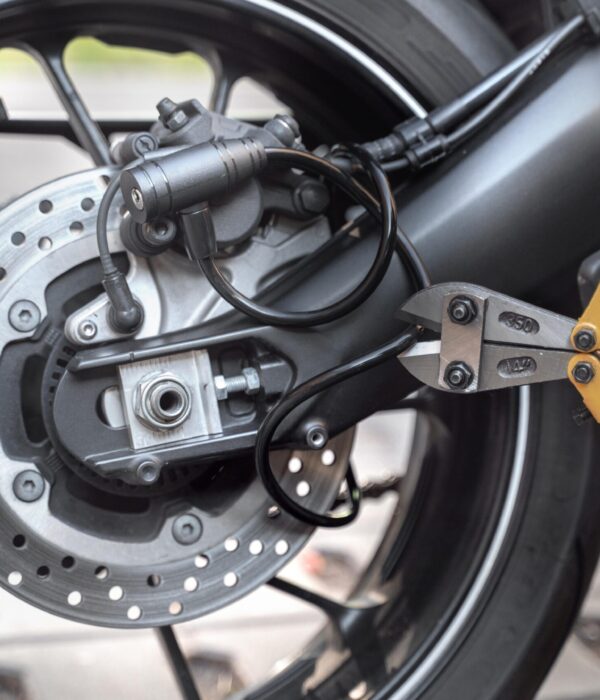 close-up-man-preparing-steal-motorcycle